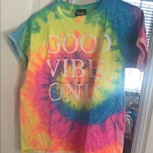 Tye dye shirt that says “good vibes only”